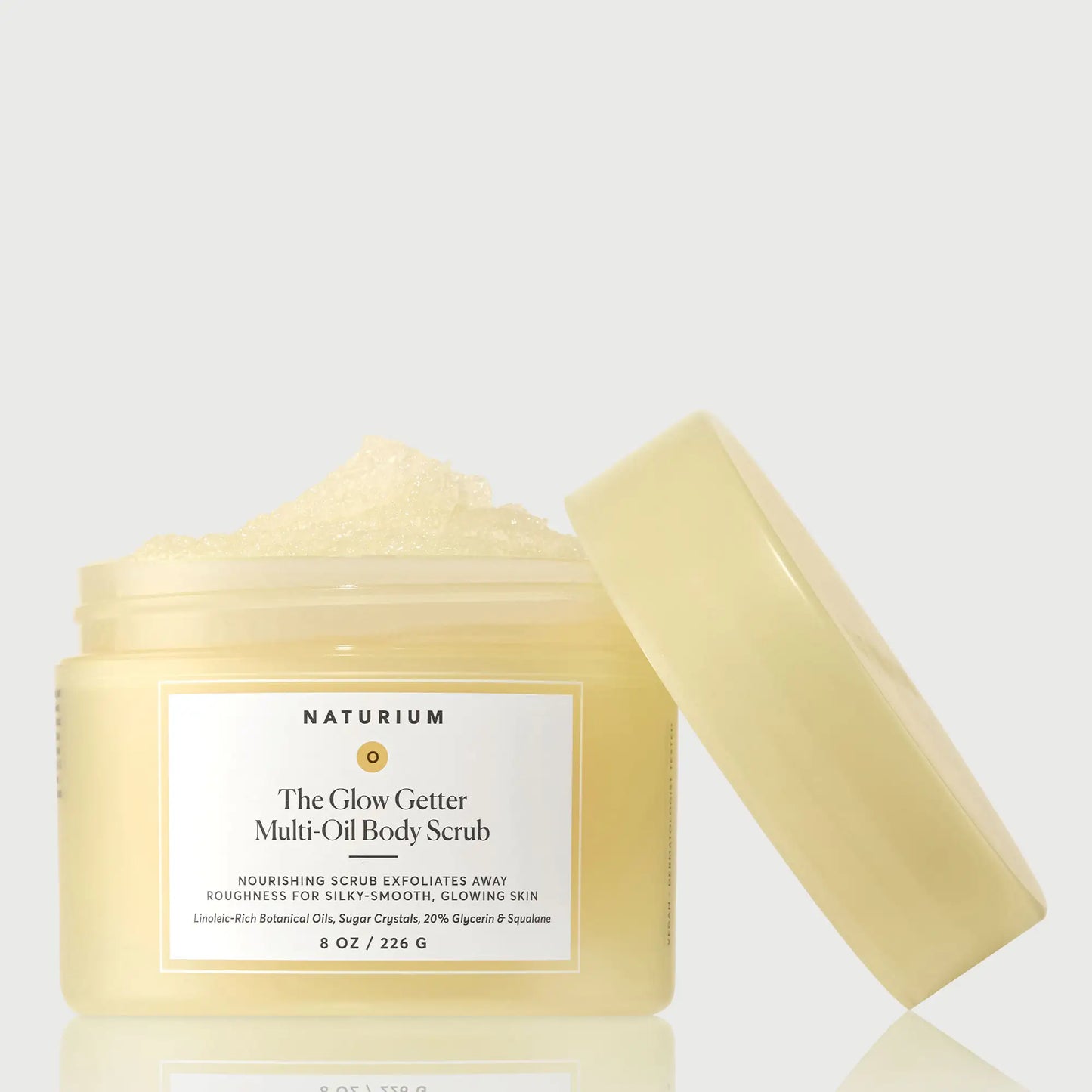 the-glow-getter-multi-oil-body-scrub-a6 NATR-40028-GlowGetter-Multi-Oil-Body-Scrub-Front-CapOff-bonebkgd.webp
