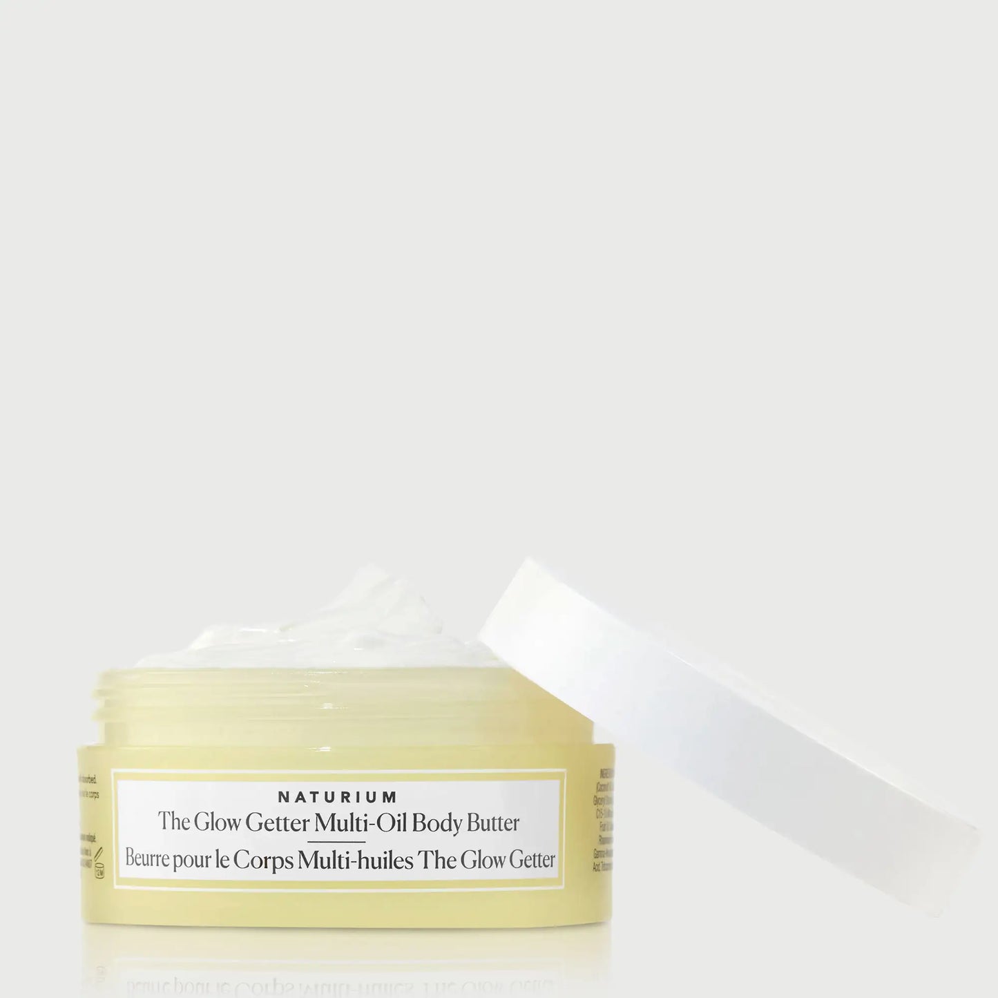 the-glow-getter-multi-oil-body-butter-travel-size-u1 NATR-40115_Glow-Getter-Body-Butter-Mini_front_capoff_bonebkgd.webp