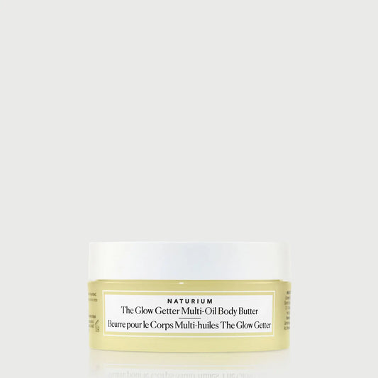 the-glow-getter-multi-oil-body-butter-travel-size-u1 NATR-40115_Glow-Getter-Body-Butter-Mini_front_capon_bonebkgd.webp